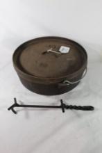 Lodge 14" Dutch oven with lid handle. Used.