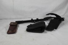 One double magazine pouch, four belt knife sheaths and one Tasco 22 cal rifle scope.