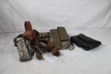 One camo nylon shoulder holster, one leather rifle sling and Bulldog belt clip leather ammo pouch.