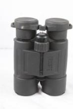 One pair of Bushnell 10x42 Banner binoculars in nylon case. Used.