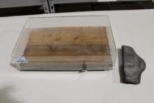 One 13 1/2" x 8 1/2" wood base display case and one small belt clip holster. Used.
