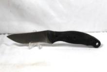 Kershaw sheath knife with 3.75 inch blade. Leather sheath. In used condition. Made in China.