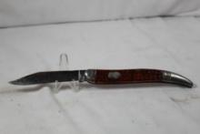 Remington fish knife Model R953. 3.5 inch blade has been broken. Jigged wood scales. Used.