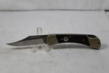 German made small lock back folder with 2.75 inch blade. Explorer/Bighorn. Wood scales.
