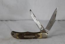 Schrade Walden two blade folding hunter with 3.75 inch blade. Blades have been put on a grinder. Saw