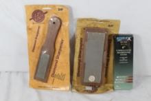 Bag of knife sharpening stones and steel. Most are in packages.