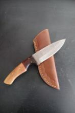 Damascus hunting knife with 5" blade and leather sheath, new in box