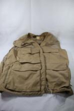 One tan colored fishing vest. In very good condition.