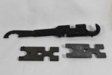 One AR-15 combo wrench and two AR barrel wrenches.