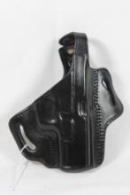Tagua black leather right handed belt holster for 4" 9mm/40 automatic. Used, but in very nice