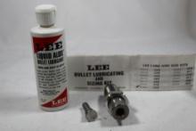 Lee bullet lube and one 323 sizer die, in good condition.