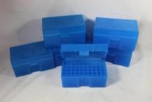 Six blue Midway 50 round cartridge ammo boxes.