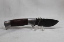 Mossy Oak small skinner with 2.75 inch blade and stacked leather washer handle. Original Cordura