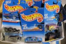 Box of 50 Hot-Wheels cars, in packages.