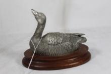 Pewter Canadian Goose on wood.