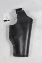 Black leather strap holster. Used. ??? for Boa. Right handed.
