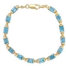 Blue Topaz Gemstone Line Bracelet in Yellow Gold