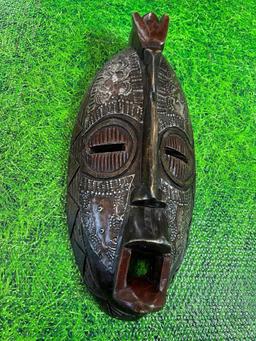 wood and metal African mask decor
