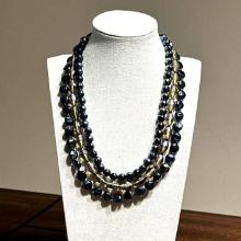 Multi Strand Black and Clear Beaded Necklace