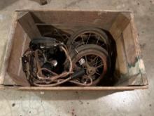 Box of rubber spoked wheels