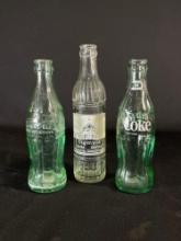 (2) Coca-Cola glass bottles
