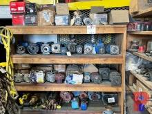 SHELF CONTENTS IN NW CORNER OF SHOP W/ HYDRAULIC MOTORS, ENGINE STARTERS, CABLE CUTTERS, SOCKETS, AI