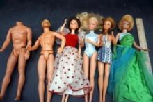 4 Barbie Dolls & 2 Ken Dolls