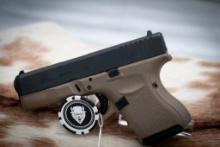 Glock model 27, Gen 4, Black and tan 40 caliber,  Serial number VDE143