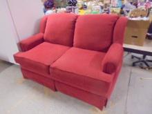Red Upholstered Love Seat