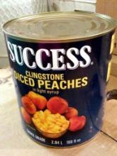 6 CANS OF PEACHES