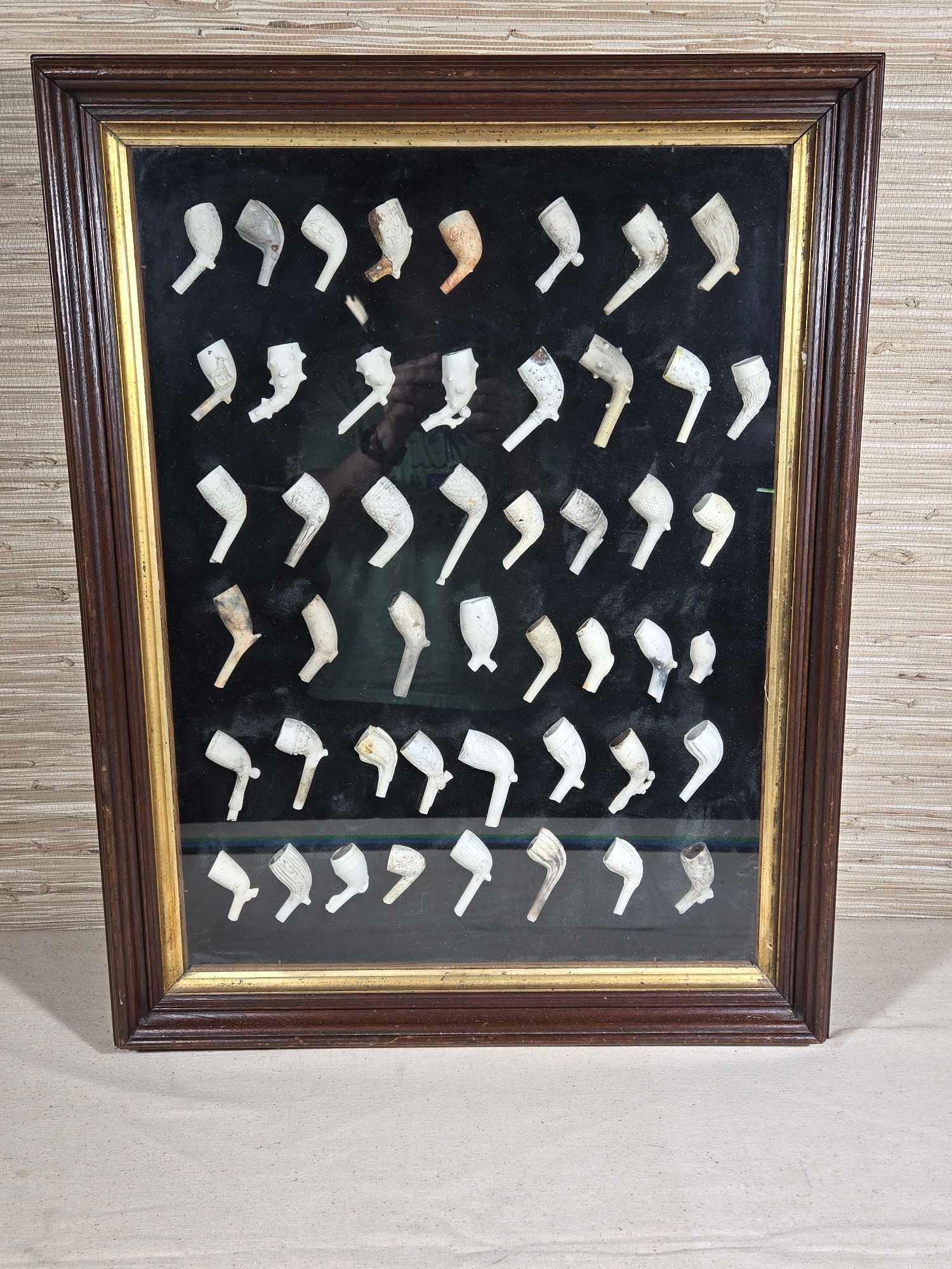 Nicely Framed Collection of Clay Pipes
