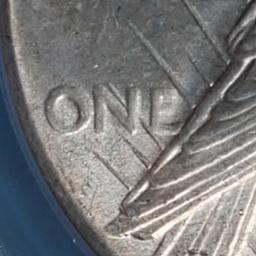 MS Quality 1927 US Silver Peace Dollar in Slab