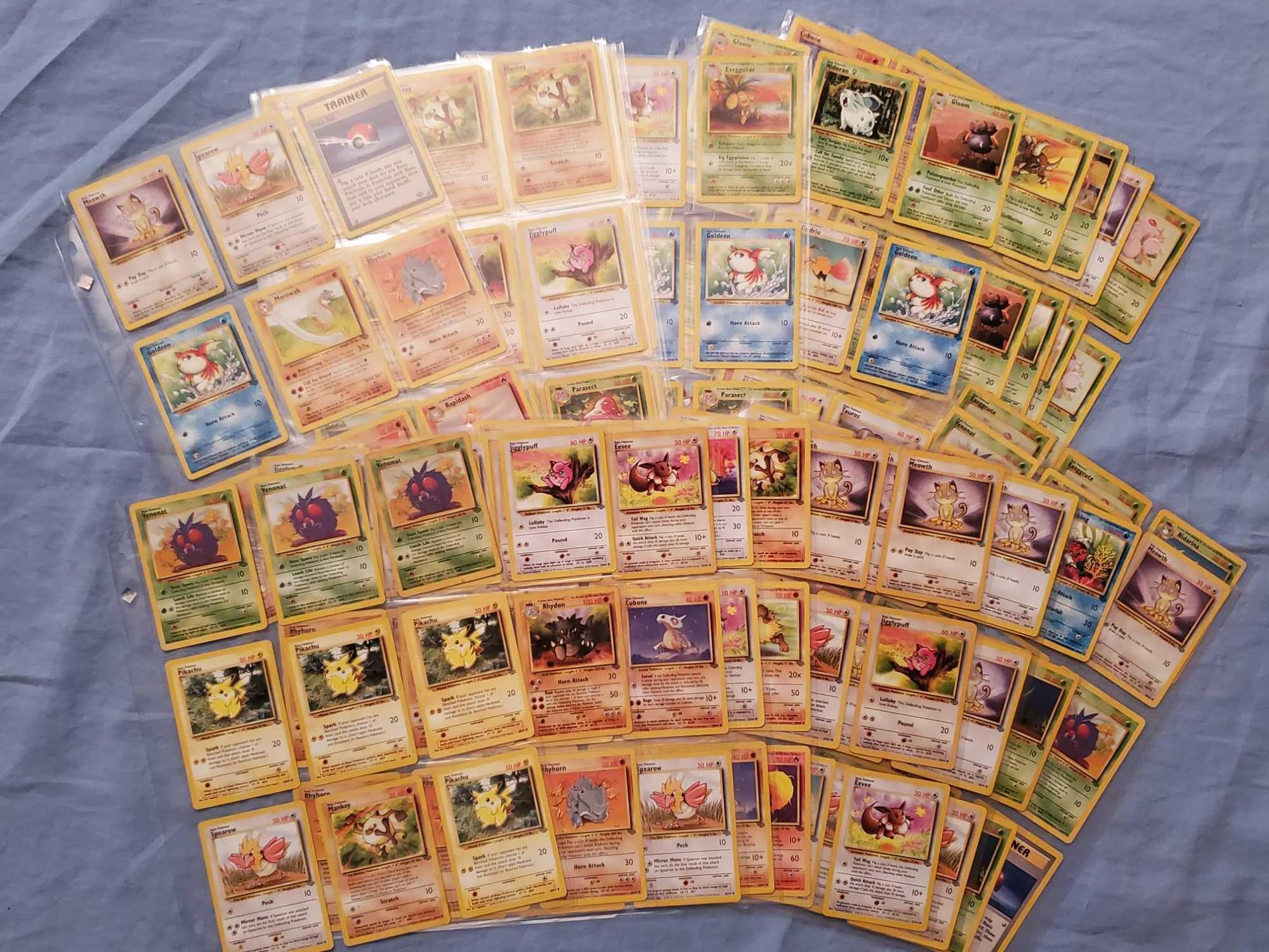 Album of 1999-2000 Pokemon Cards - Base, Jungle, Fossil, and Team Rocket