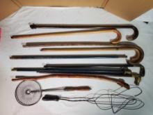 9 Vintage Canes and Walking Sticks and 2 Antique Rug Beaters