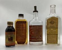 Four Early Mercantile Bottles