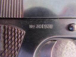 handgun: COLT Model 1911, Semi-Auto Pistol, .45, 7 shot, 5" barrel, S#301938