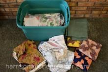 TOTE OF MATERIAL, LINENS, AND QUILTS