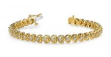 14K YELLOW GOLD .90 CTW G-H I1/I2 FLOATING DIAMOND HEART BRACELET