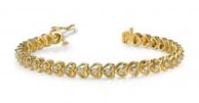 14KT YELLOW GOLD .90 CTW G-H VS2/SI1 FLOATING DIAMOND HEART BRACELET