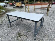 Grey Metal Table on Wheels