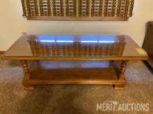 Wooden coffee table with glass protector