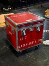 RED ROAD CASE WITH WHEELS, SEE PHOTOS FOR APPROXIMATE MEASUREMENTS.