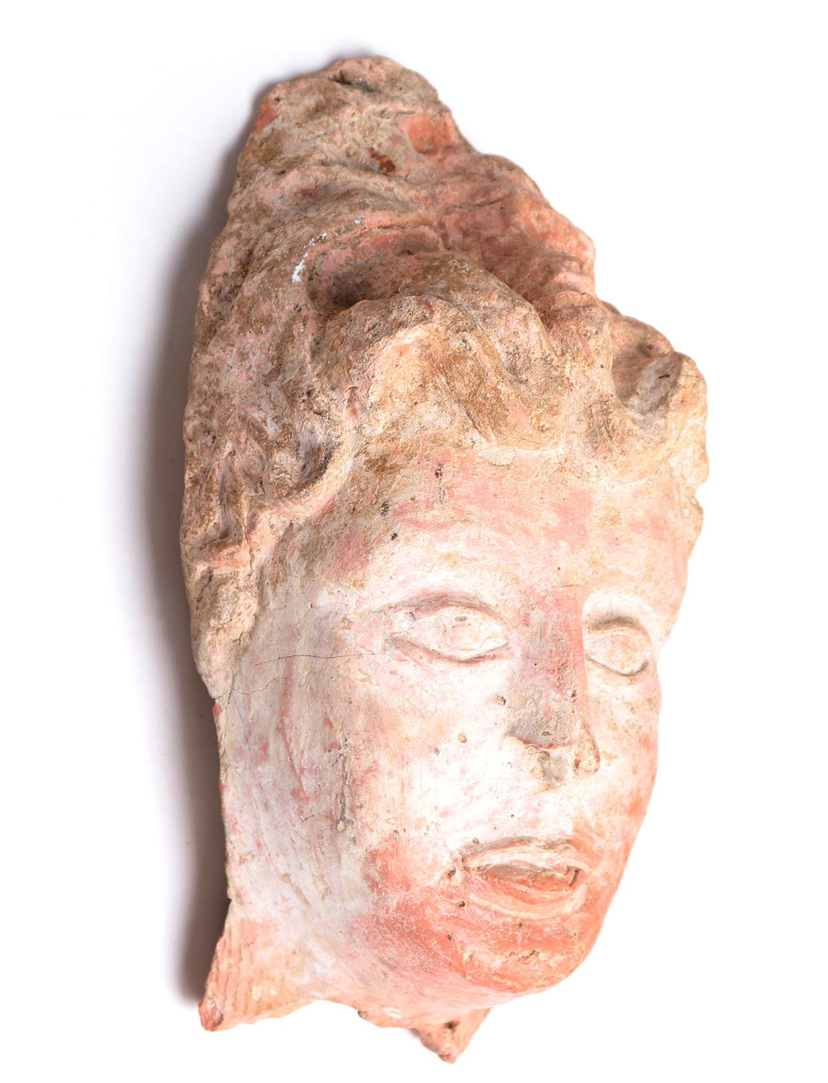 Old Terracotta Head in the Greek Style