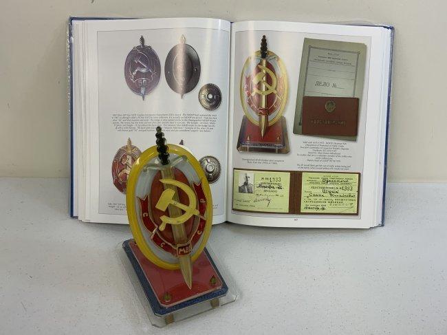 USSR DISTINQUISHED MVD WORKER DESK ORNAMENT WITH BOOK BY R. PANDIS