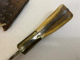 ANTIQUE AMERICAN FIGHTING KNIFE IN DECORATED LEATHER SHEET