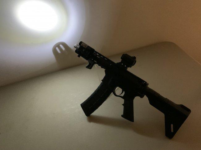 AMERICAN TACTICAL AR15 5.56 SEMI AUTO PISTOL WITH FLASHLIGHT AND LASER