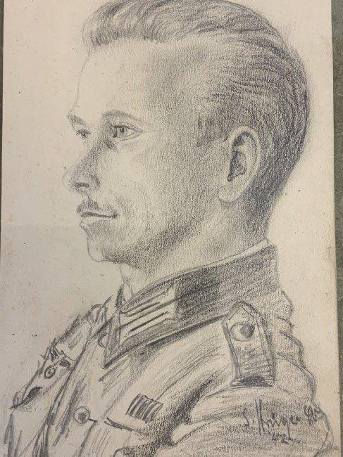 WWII GERMAN FRAMED PENCIL DRAWING OF A SOLDIER SIGNED AND DATED 1942