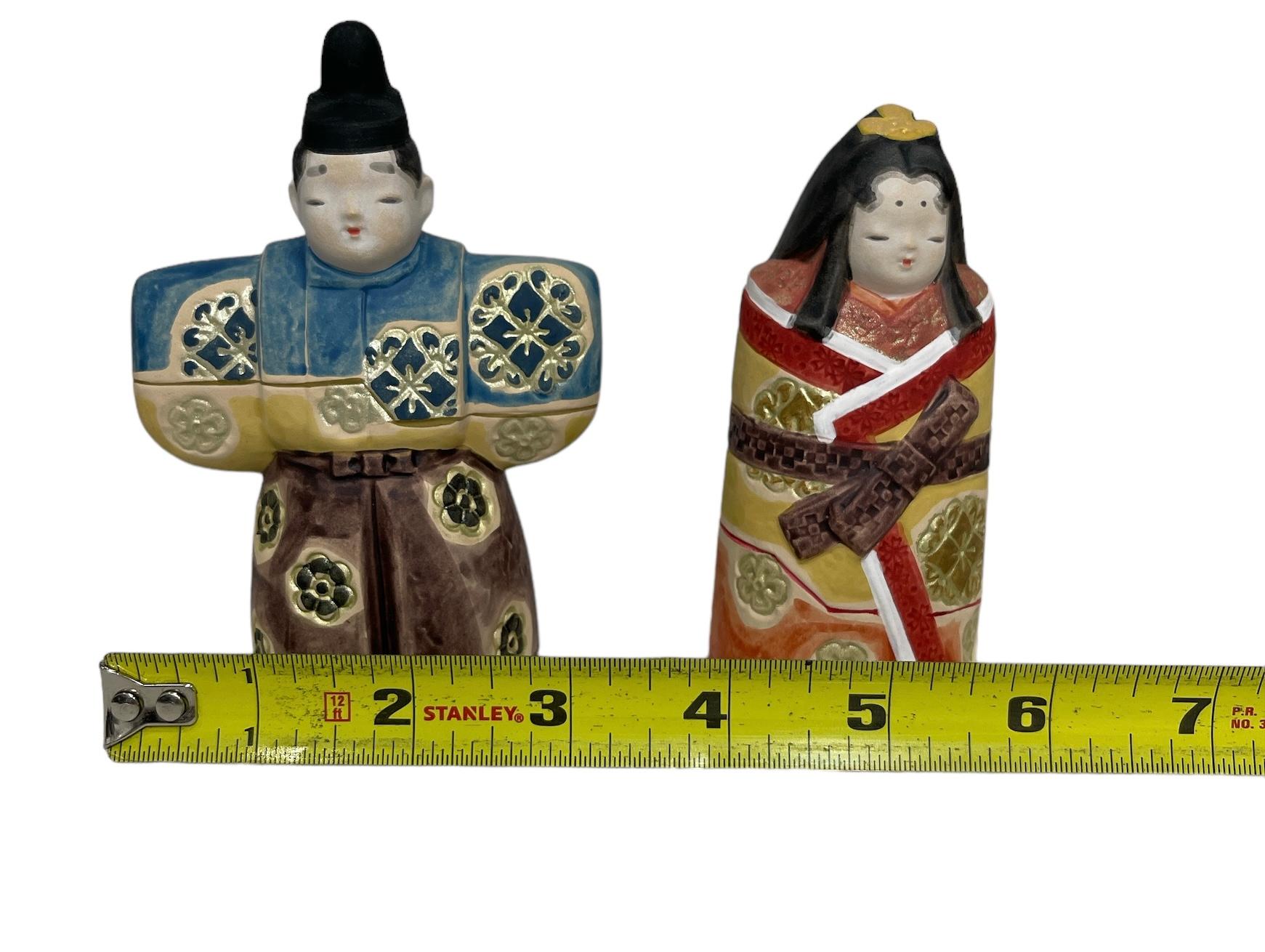 Hina and Hinamatsuri Hina Dolls and Japanese Praying Statue