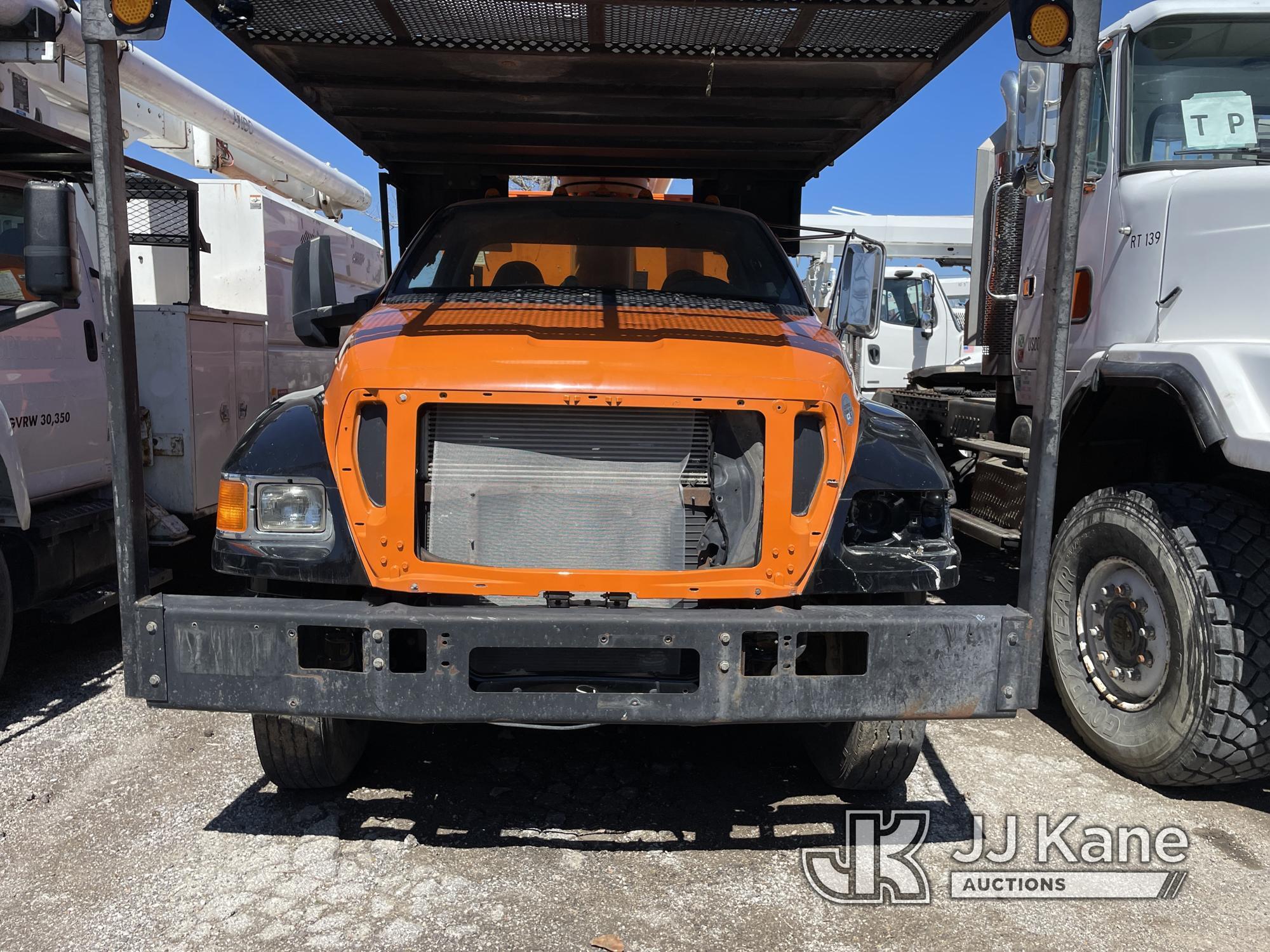 (Kansas City, MO) Altec LR756, Over-Center Bucket Truck mounted behind cab on 2013 Ford F750 Chipper