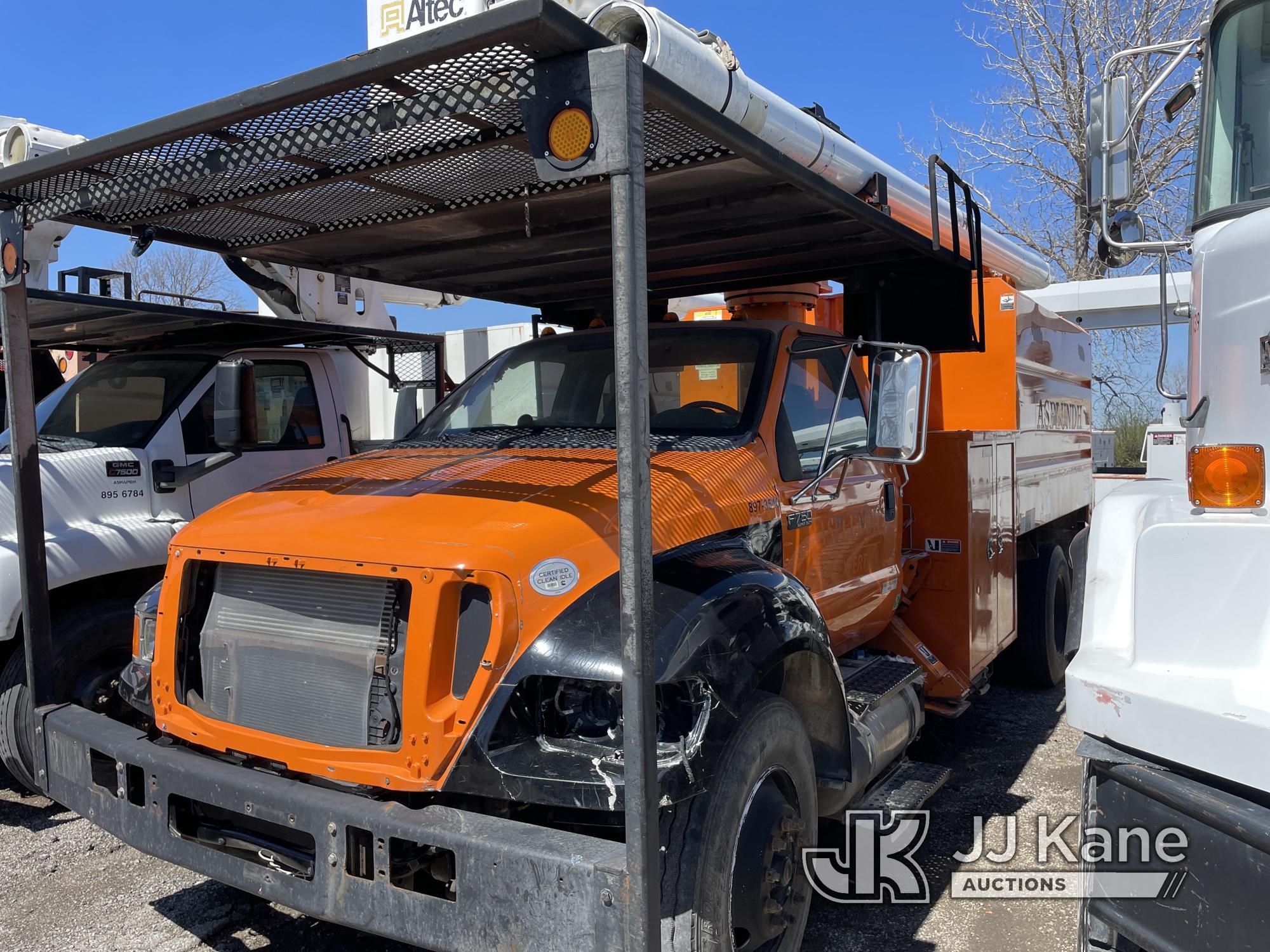 (Kansas City, MO) Altec LR756, Over-Center Bucket Truck mounted behind cab on 2013 Ford F750 Chipper